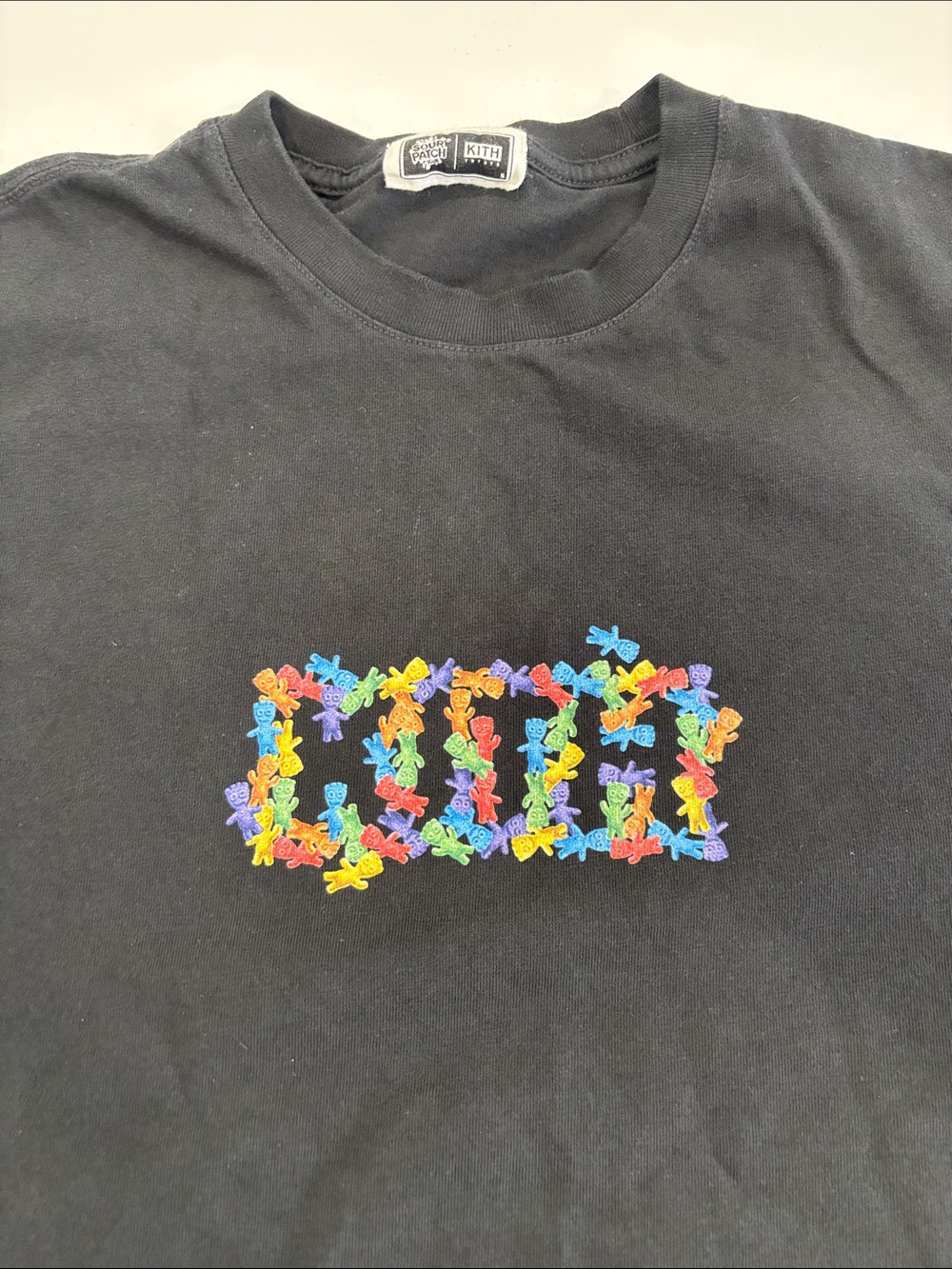 Kith Black Tee With White Label Graphic View 4